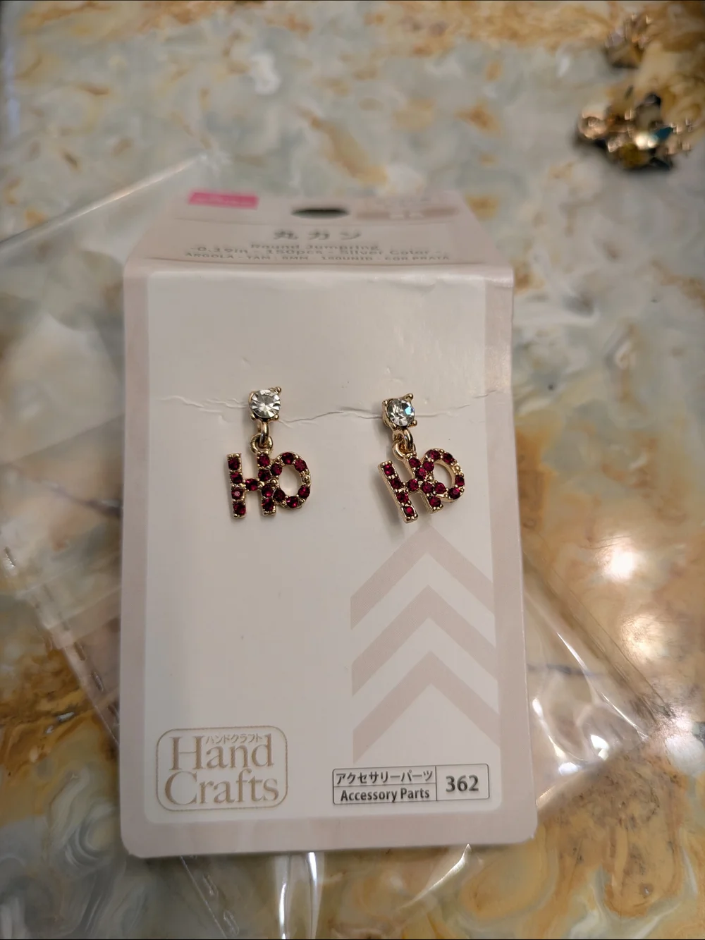 Gold-tone HO Christmas Drop Earrings with Clear Stones Studs
